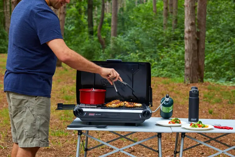 Coleman Tabletop 2-in-1 Camping Grill & Stove, 20,000 BTUs, 4 Burners, PerfectHeat, 130 sq. in. Grilling Area