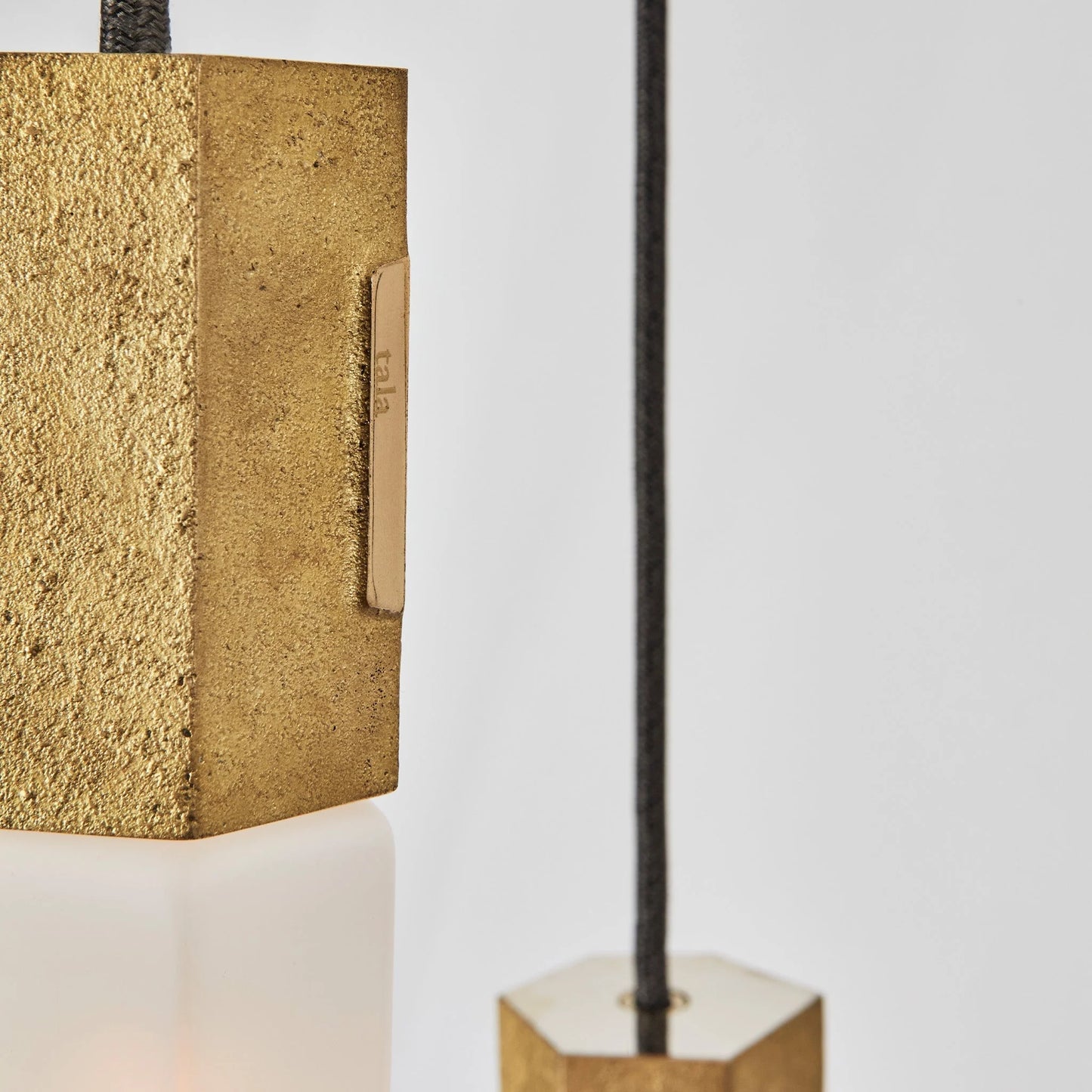 The Original Basalt Nine Pendant in Brass