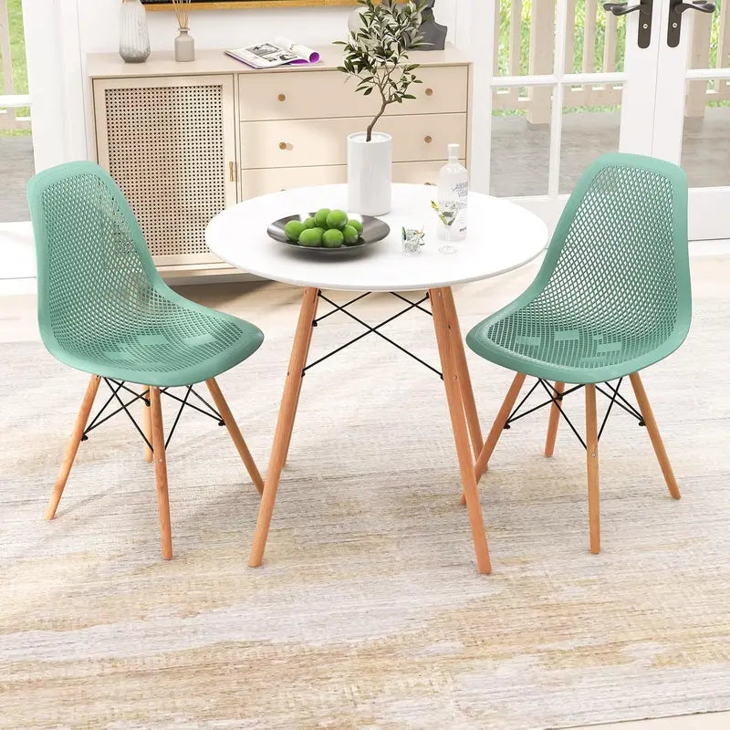 Modern 31.5-Inch Round Dining Set: White Table with Green DSW-Inspired Chairs and Solid Wood Legs—Optimized for Compact Homes and Restaurants