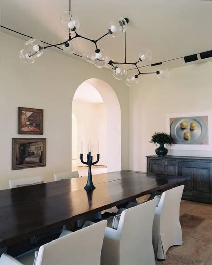 Orvani Linear Globe Chandelier in Modern Industrial Style