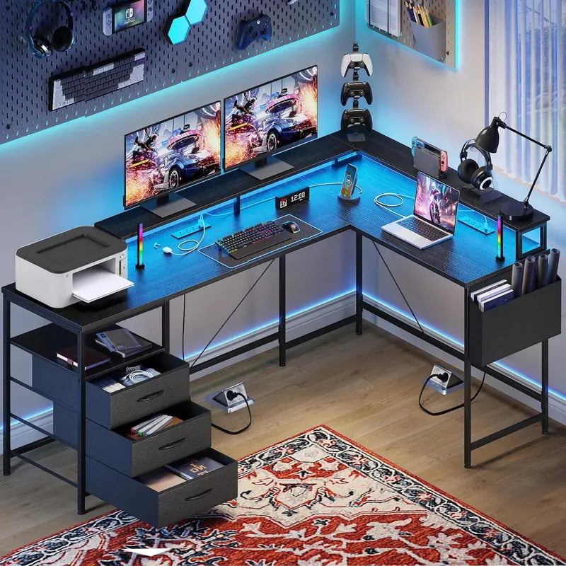 L-Shaped Gaming Desk  63-Inch Black Workstation with Dual Monitor Stands, Built-in LED Lighting, Power Strips, and Fabric Drawers