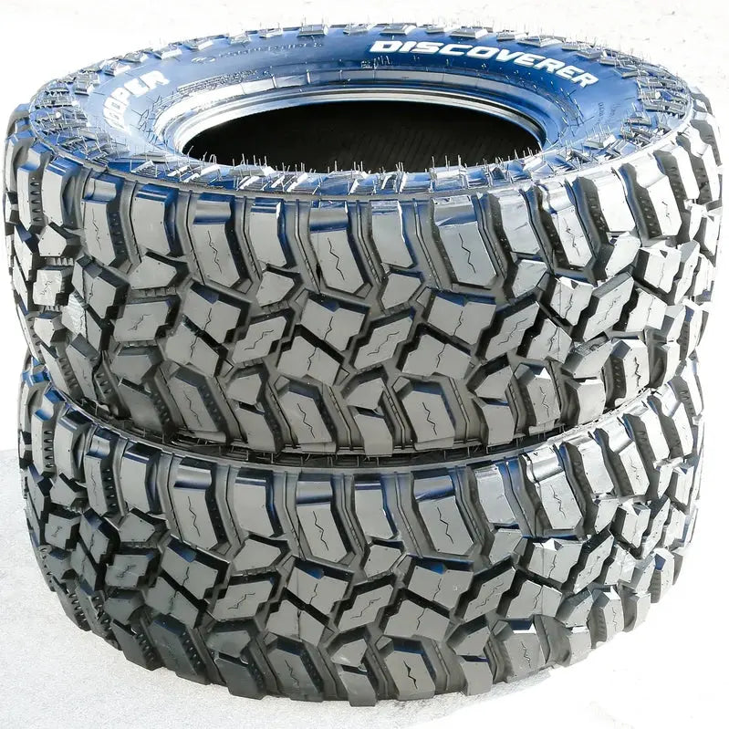 Four Cooper STT Pro LT 275/70R18 E-Rated Mud-Terrain Tires  Aggressive Tread Design