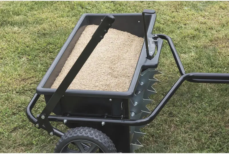 100-Lb Traction-Type Multi-Function Seeder and Sprayer  Black Finish