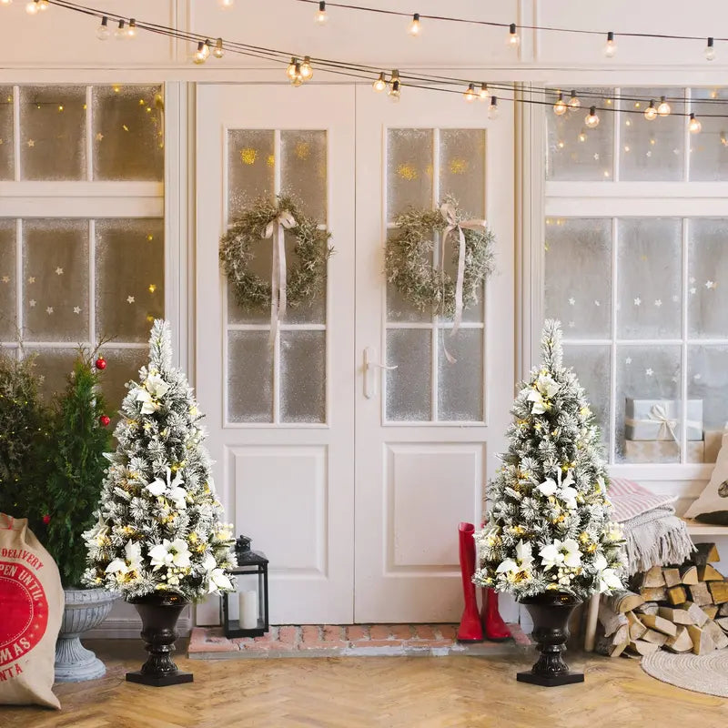 White Flocked Entryway Christmas Tree with Warm White Pre-Installed LED Lights