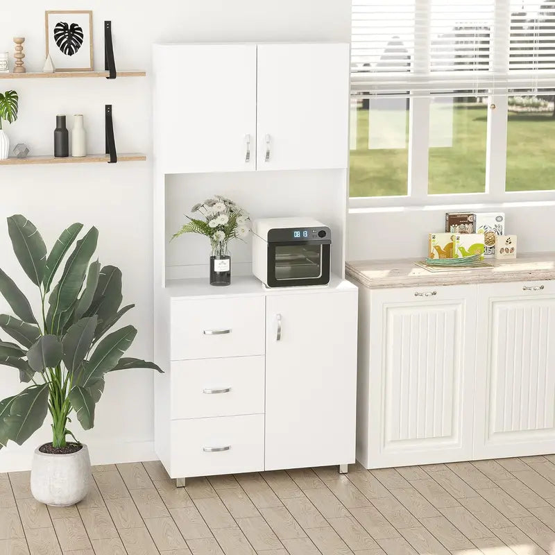 White Freestanding Kitchen Pantry with Open Countertop, Three Drawers, and Adjustable Interior Shelf—Functional Microwave and Storage Solution