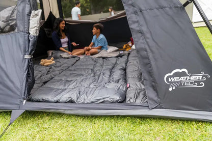 Coleman 4-Person Weatherproof Camping Tent with Instant Setup and Vented Rainfly