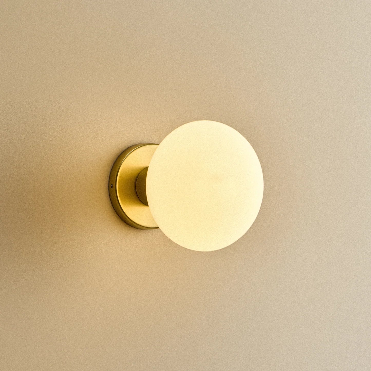 Lochan Wall Light in Brass + Oval Dim to Warm