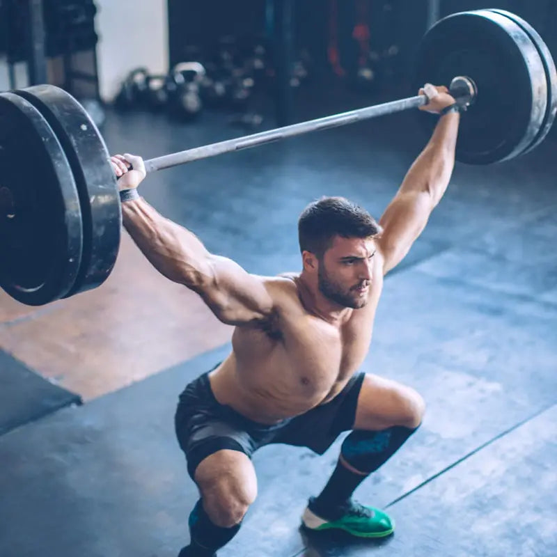 7-Foot Solid Olympic Barbell  Rated for 7001000 lbs, Compatible with 2-Inch Plates
