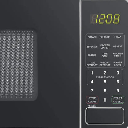 Mainstays 0.7 Cu. Ft. Countertop Microwave Oven  700-Watt, Compact White Appliance with Simple Controls
