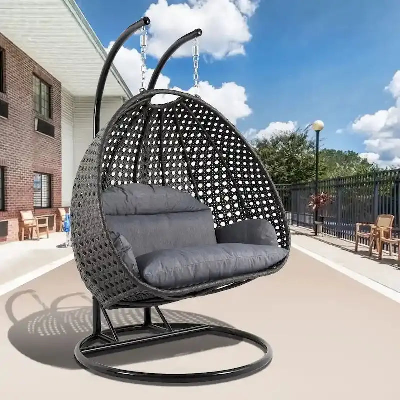 LeisureMod Two-Person Hanging Egg Chair  Indoor/Outdoor Wicker Swing with Stand & Cushions