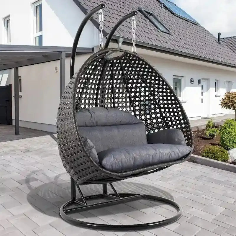 LeisureMod Two-Person Hanging Egg Chair  Indoor/Outdoor Wicker Swing with Stand & Cushions