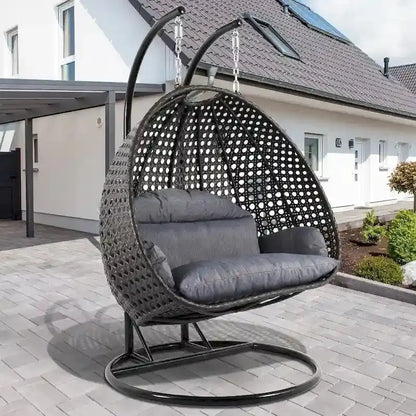 LeisureMod Two-Person Hanging Egg Chair  Indoor/Outdoor Wicker Swing with Stand & Cushions