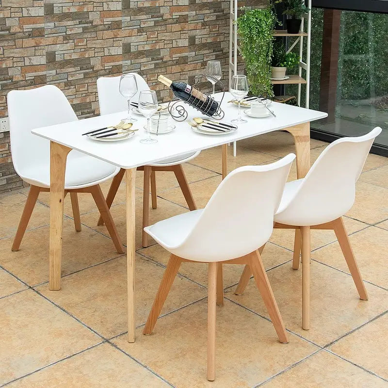 Set of Four Mid-Century Modern Armless Dining Chairs: Padded Seats, Wood Legs, and Clean White Finish for Kitchens and Waiting Areas