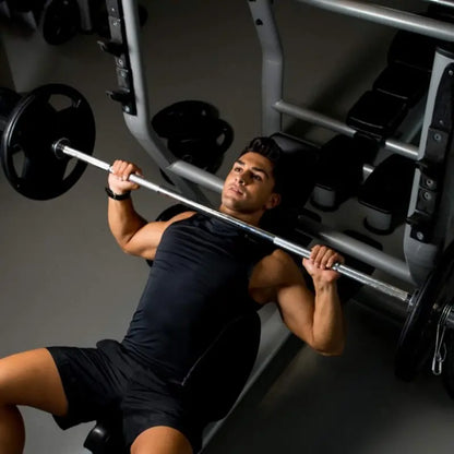7-Foot Solid Olympic Barbell  Rated for 7001000 lbs, Compatible with 2-Inch Plates