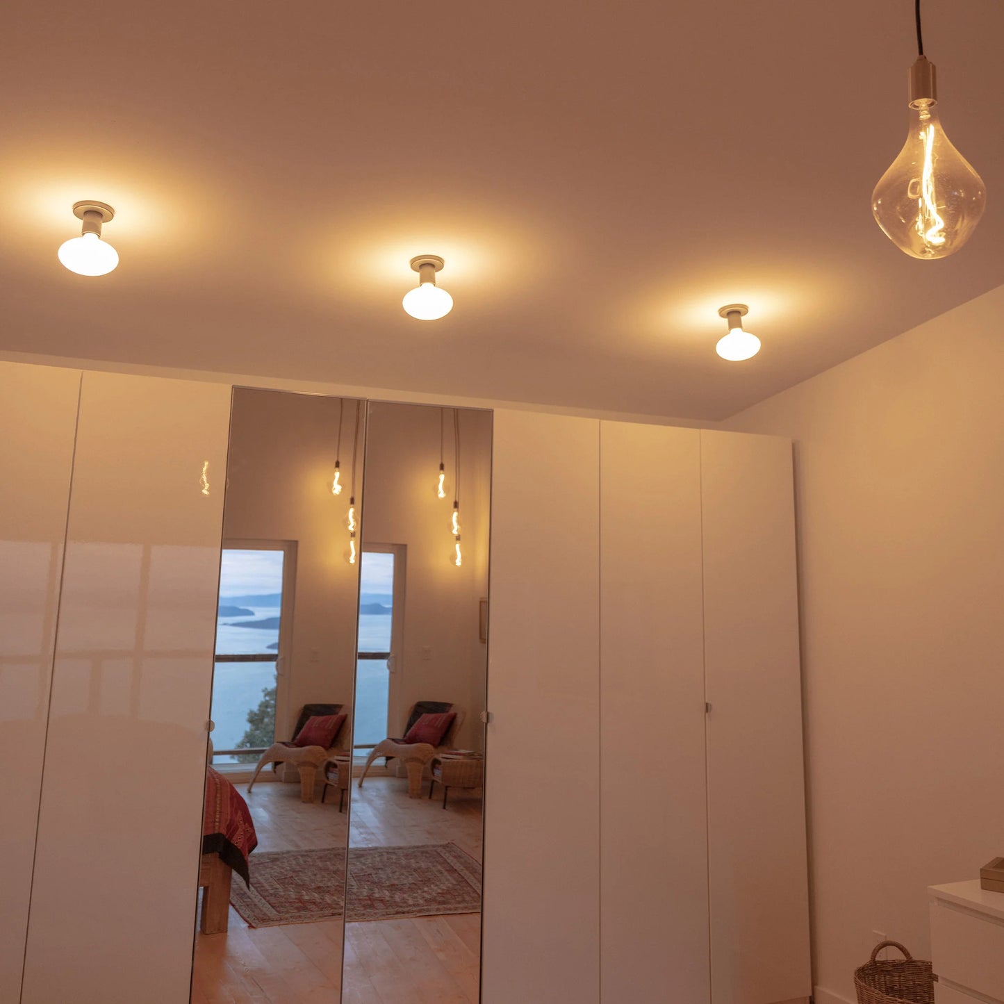 Lochan Wall Light in Brass + Oval Dim to Warm