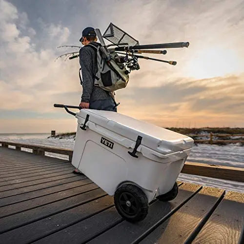 YETI Tundra Haul Wheeled Cooler  Rugged Portable Cooler with All-Terrain Wheels & Bear-Resistant Design