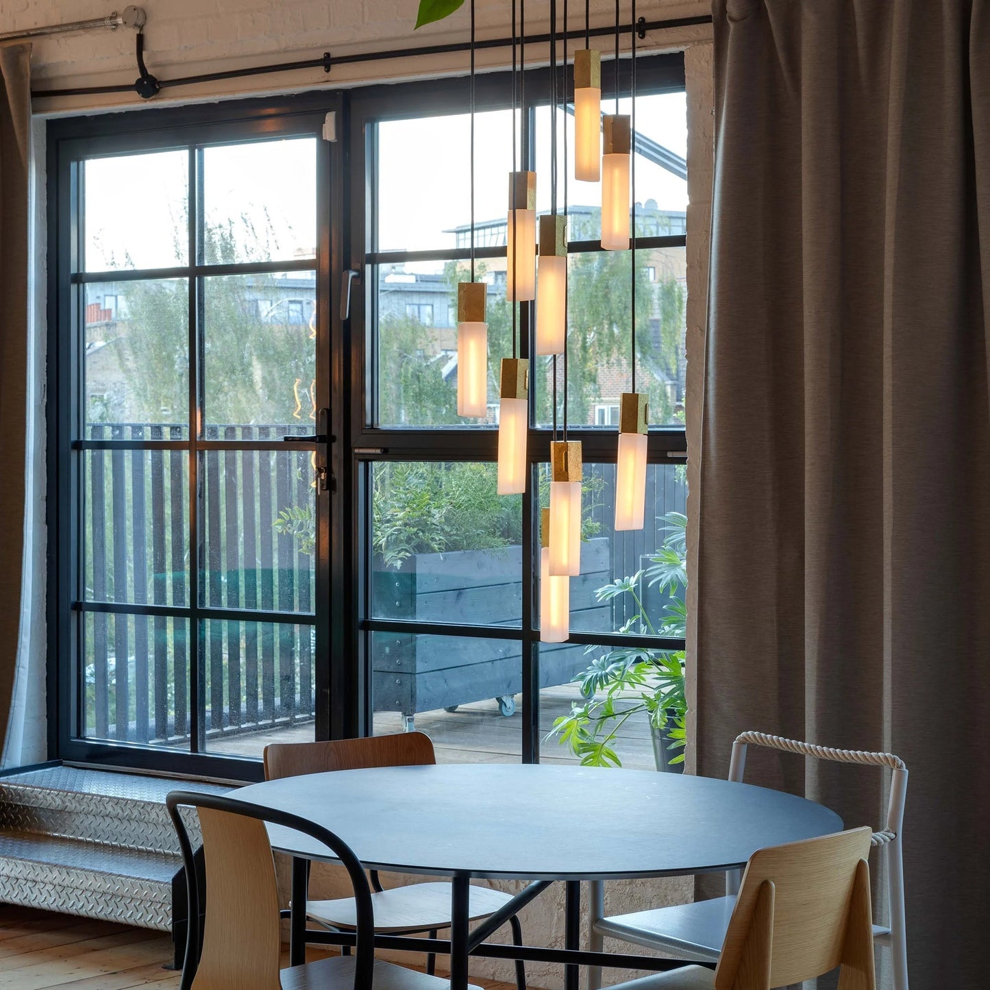 The Original Basalt Nine Pendant in Brass