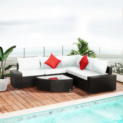 6-Piece PE Rattan Patio Furniture Set with Beige Cushions & Fan-Shaped Glass Coffee Table
