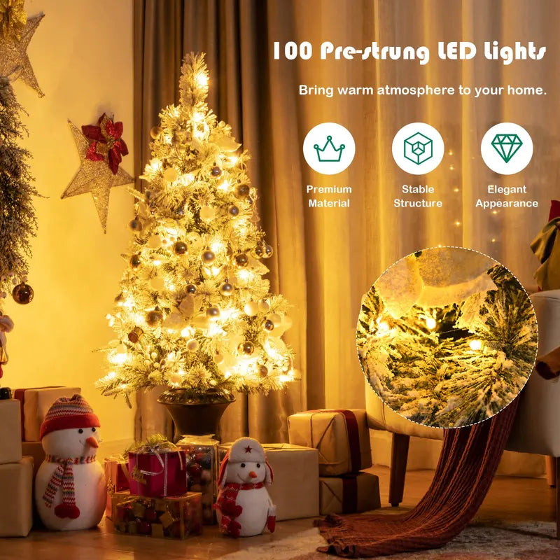 White Flocked Entryway Christmas Tree with Warm White Pre-Installed LED Lights