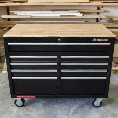 High-Gloss Black Mobile Workbench with 9 Drawers, Hardwood Work Surface, and Built-in Power Outlet