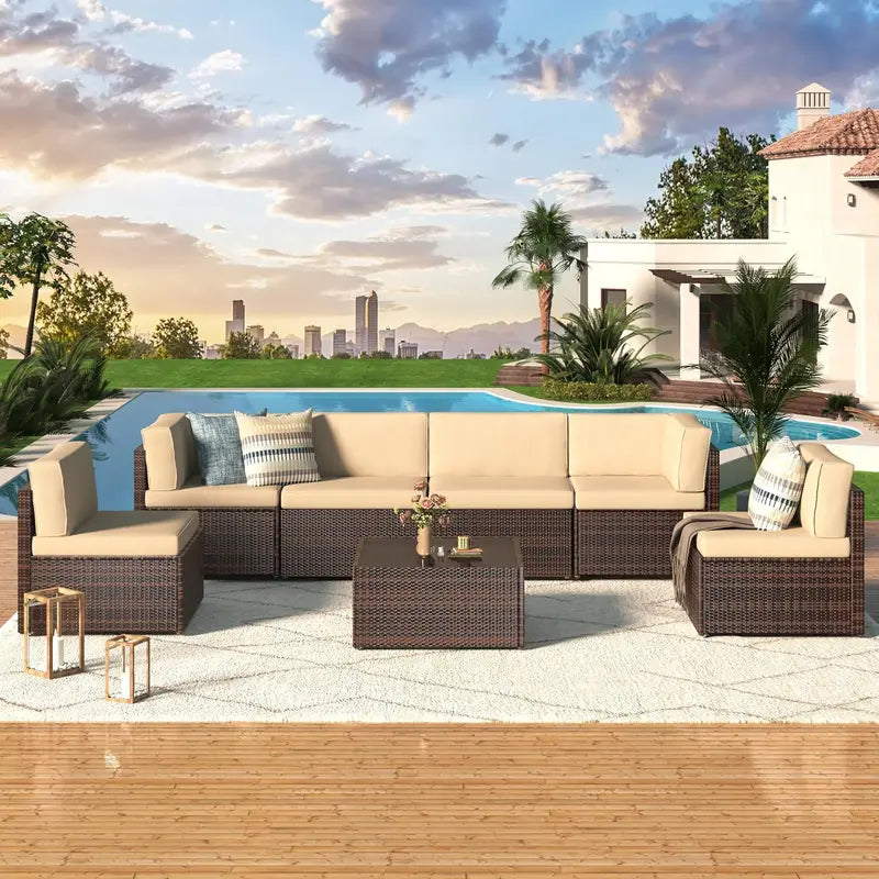 7-Piece PE Rattan Patio Furniture Set  Navy Cushioned Sectional Sofa, Tea Table & Black Wicker Frame for Backyard Use