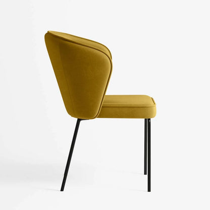Chaise en velours jaune moutarde